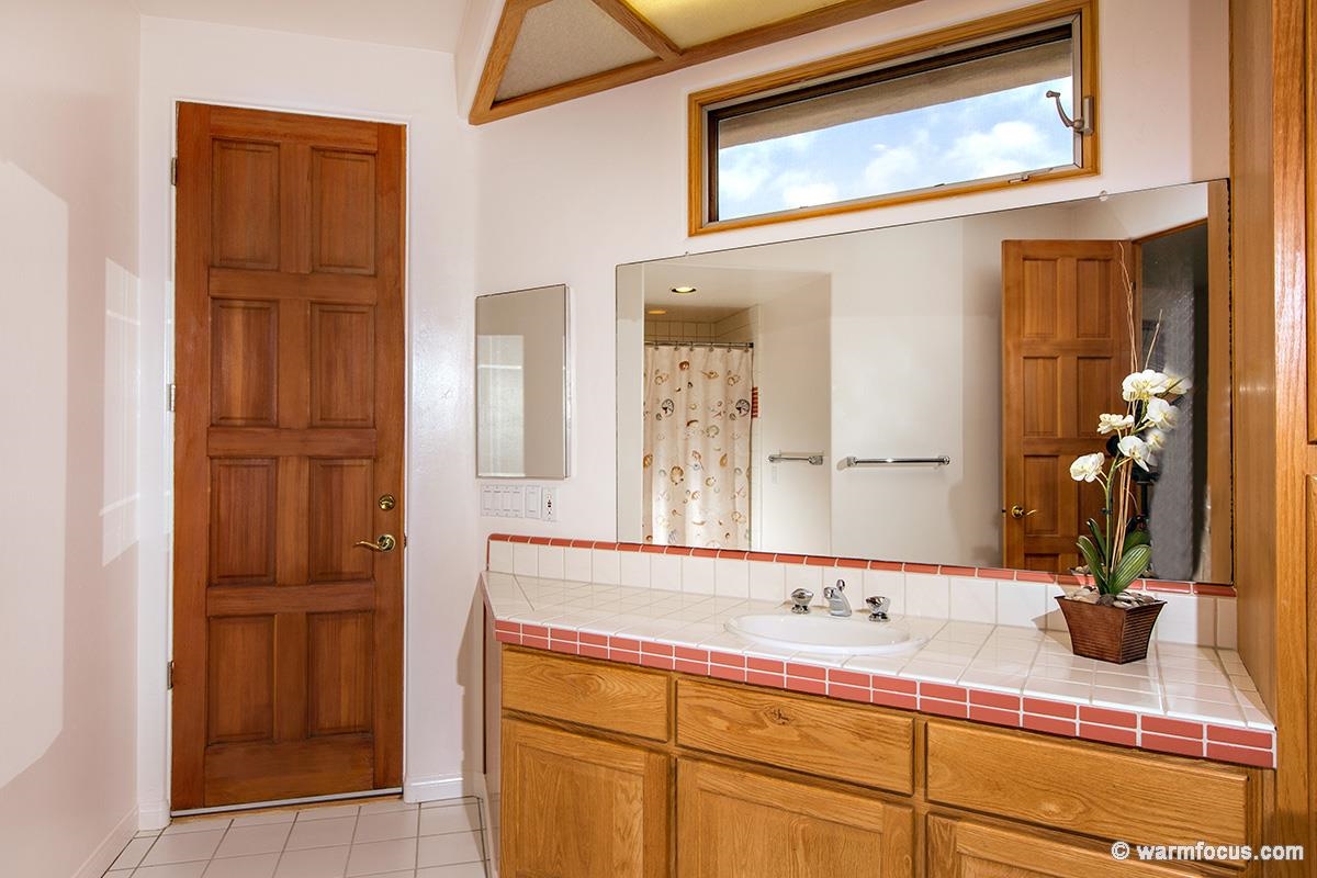 4610 Rancho Reposo Del Mar, CA 92014 - Photo 16 of 25 Downstairs bathroom with pool access makes after pool cleanup easy!