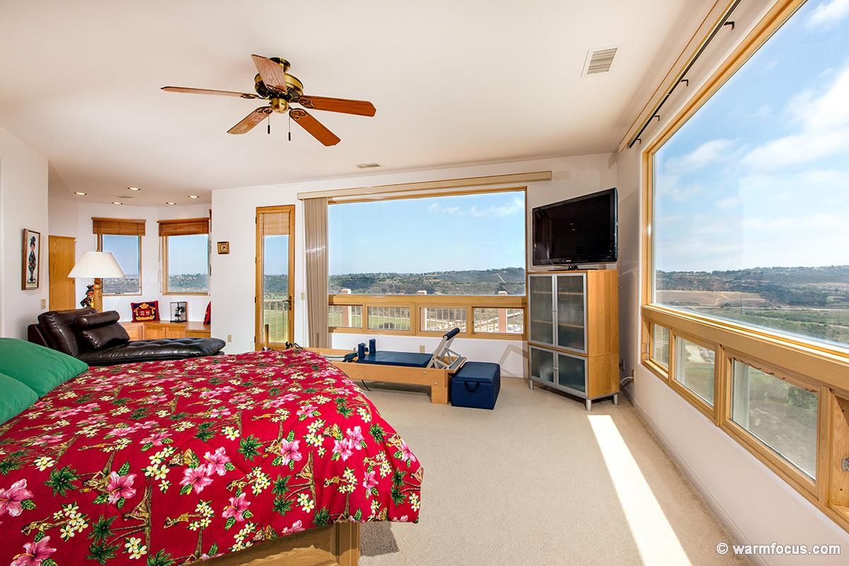 4610 Rancho Reposo Del Mar, CA 92014 - Photo 19 of 25 The master bedroom has a private balcony, a separate sitting area, a bathroom area and walk in closet with a deep, doorless shower area you will love.