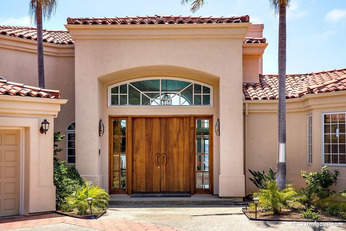 4610 Rancho Reposo Del Mar, CA 92014 - Photo 3 of 25 Majestic front doors and window above.