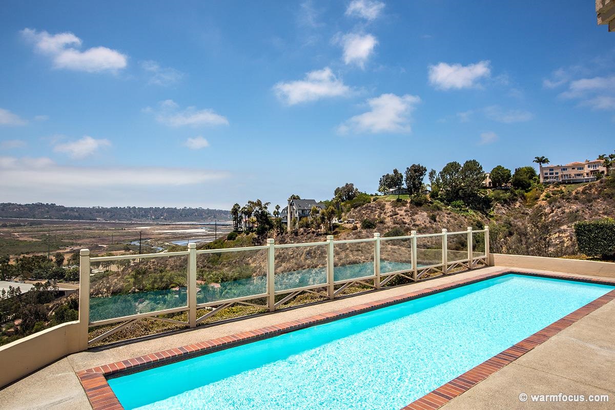 4610 Rancho Reposo Del Mar, CA 92014 - Photo 9 of 25 This lap pool has a wind barrier and a fabulous view of the surroundings. You can either access the pool from the downstairs bedroom or the family room.