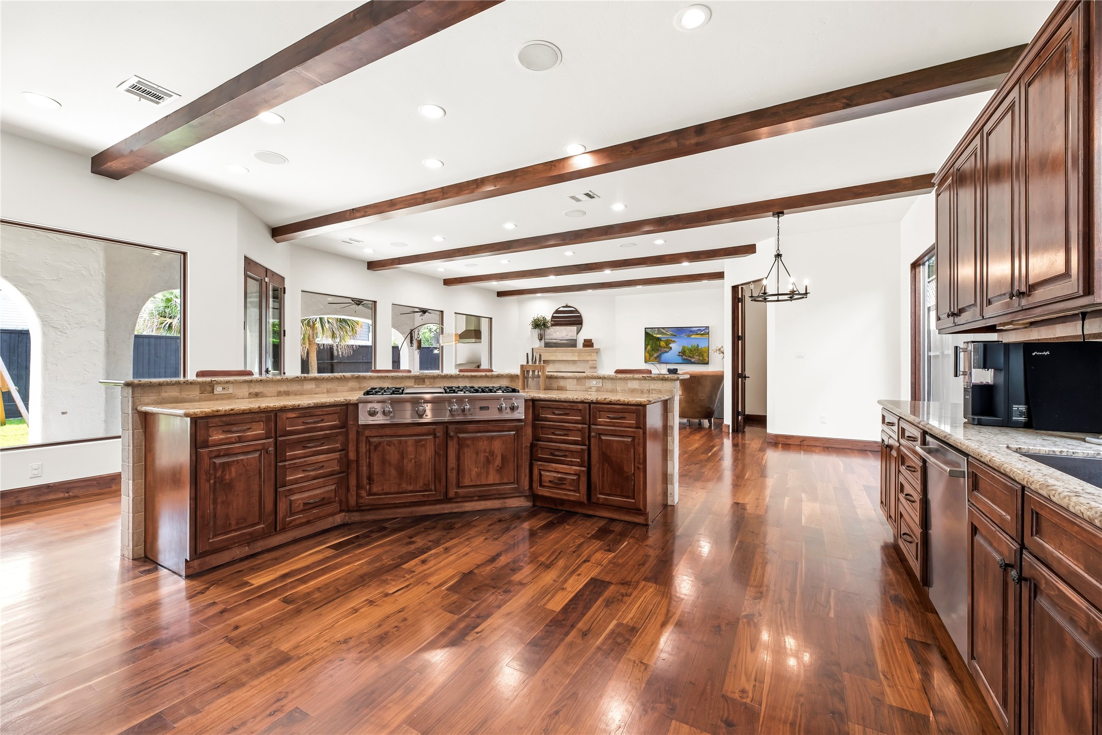 3803 Drake Street Houston, TX 77005 - Photo 12 of 32 a large kitchen with lots of counter space and wooden floor