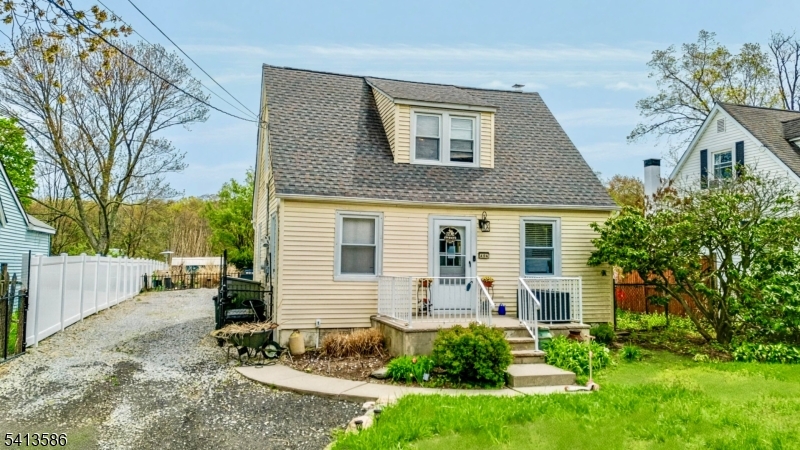 406 Morsetown Road West Milford, NJ 07480 - Photo 1 of 17 a front view of a house with a yard and outdoor seating