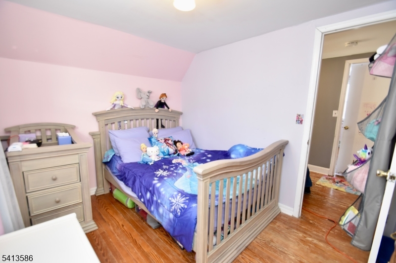 406 Morsetown Road West Milford, NJ 07480 - Photo 14 of 17 a bedroom with a baby bed baby crib and a dresser