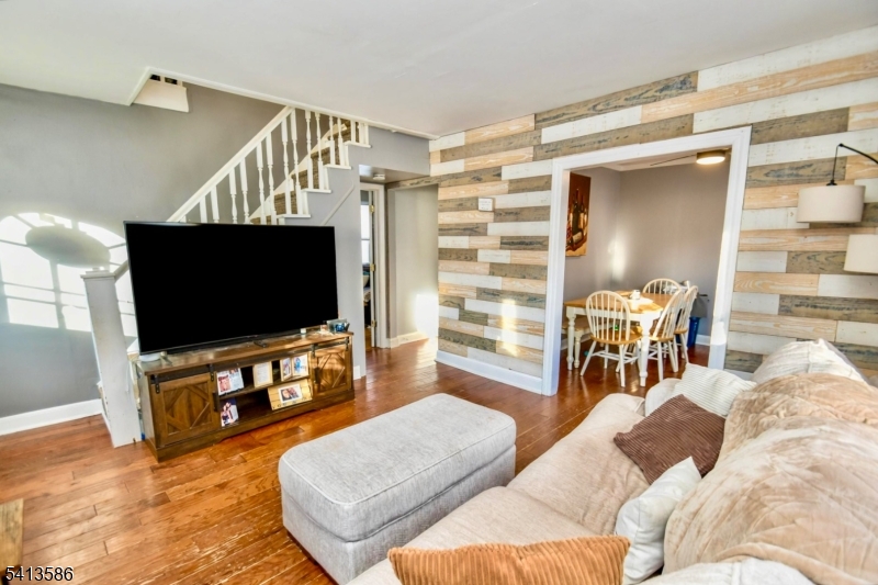 406 Morsetown Road West Milford, NJ 07480 - Photo 2 of 17 a living room with furniture and a flat screen tv