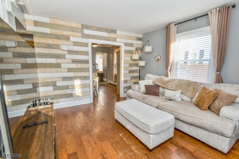 406 Morsetown Road West Milford, NJ 07480 - Photo 3 of 17 a living room with furniture and a large window