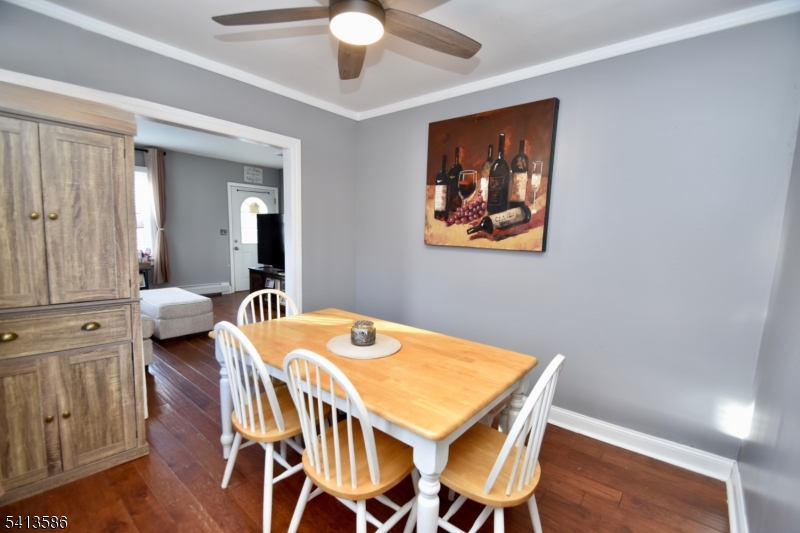 406 Morsetown Road West Milford, NJ 07480 - Photo 5 of 17 a view of a dining room with furniture and wooden floor