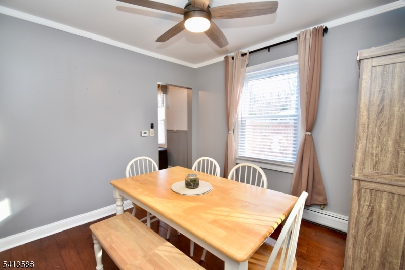406 Morsetown Road West Milford, NJ 07480 - Photo 7 of 17 a view of a dining room with furniture window and wooden floor