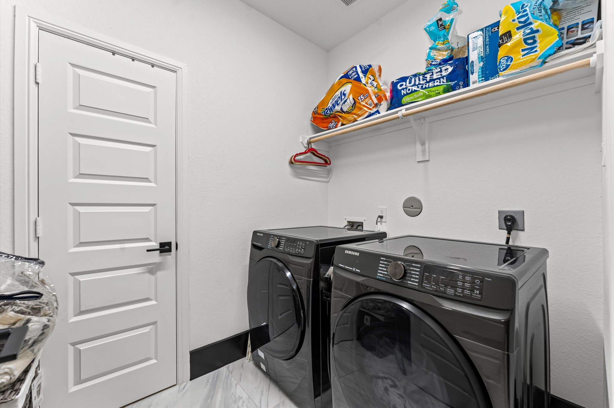 8210 Rimini Cove Court Richmond, TX 77407 - Photo 28 of 42 a utility room with dryer and washer