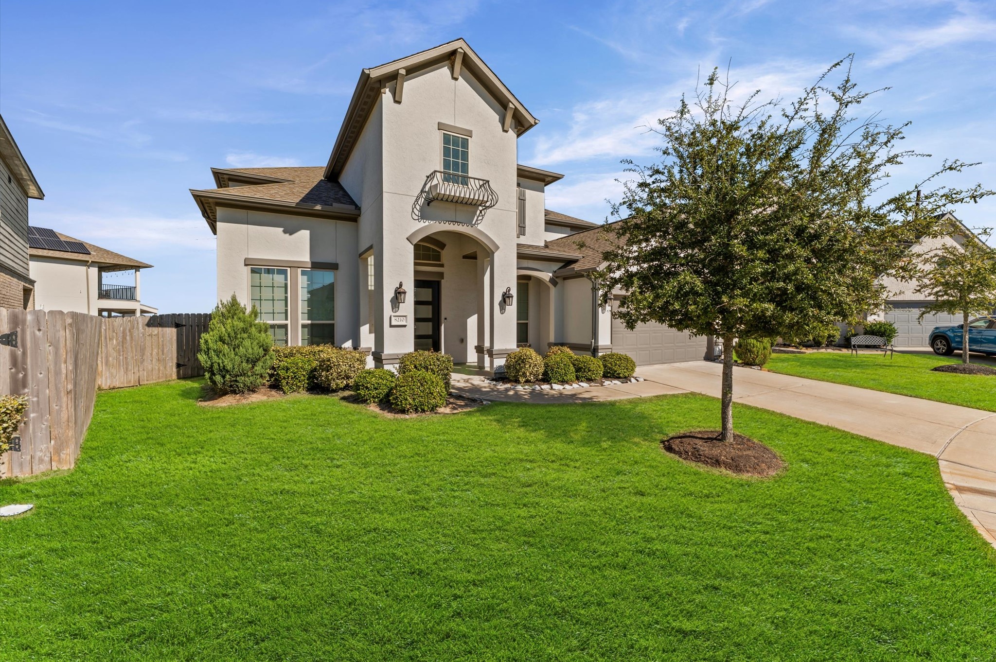 8210 Rimini Cove Court Richmond, TX 77407 - Photo 3 of 42 a front view of a house with a yard