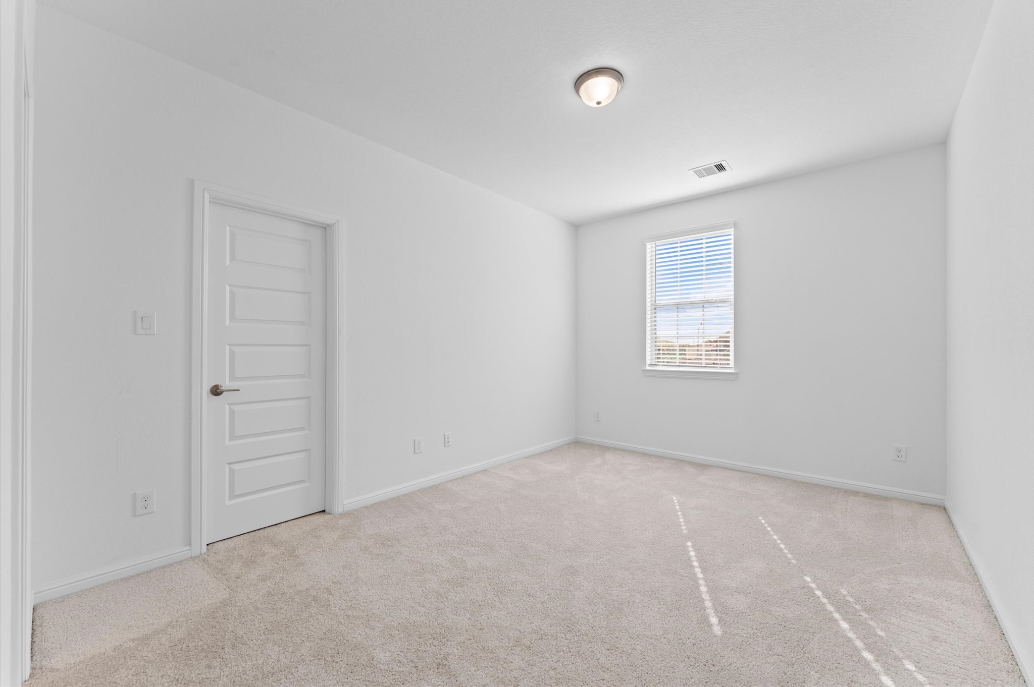 8210 Rimini Cove Court Richmond, TX 77407 - Photo 35 of 42 an empty room with windows