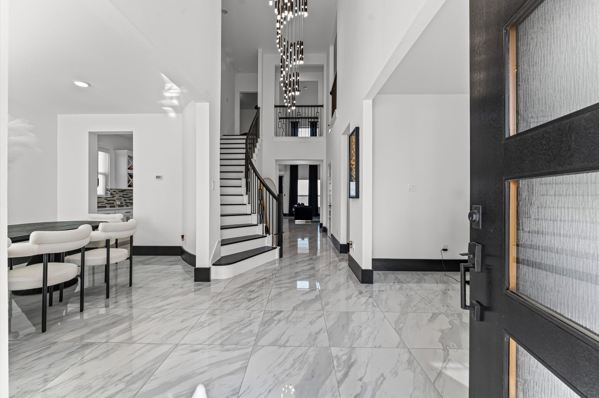 8210 Rimini Cove Court Richmond, TX 77407 - Photo 7 of 42 a view of a hallway with seating area