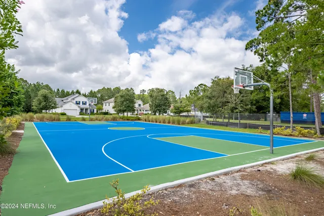 a view of outdoor space with swimming pool and seating