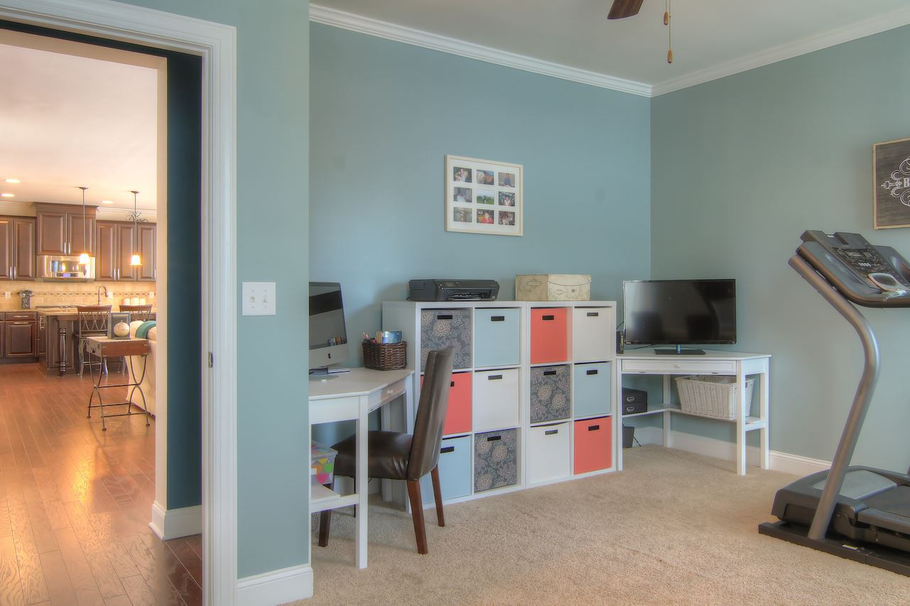 8333 Henderson Road Apex, NC 27539 - Photo 12 of 25 First floor bedroom with full bath conveniently located off the family room. 1st Floor Bedroom