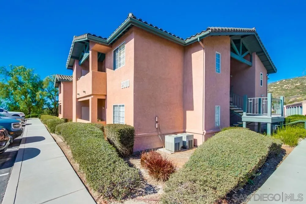 17161 Alva Road, Unit 2323 San Diego, CA 92127 - Photo 1 of 23 a front view of a house with garden