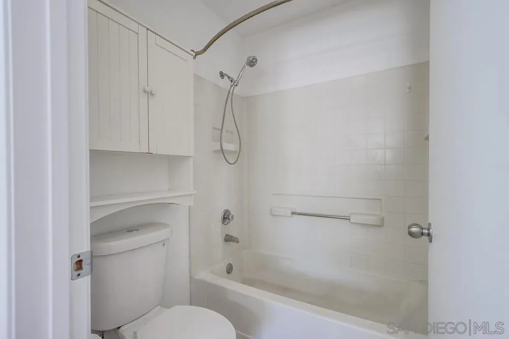 17161 Alva Road, Unit 2323 San Diego, CA 92127 - Photo 18 of 23 a bathroom with a shower and a toilet
