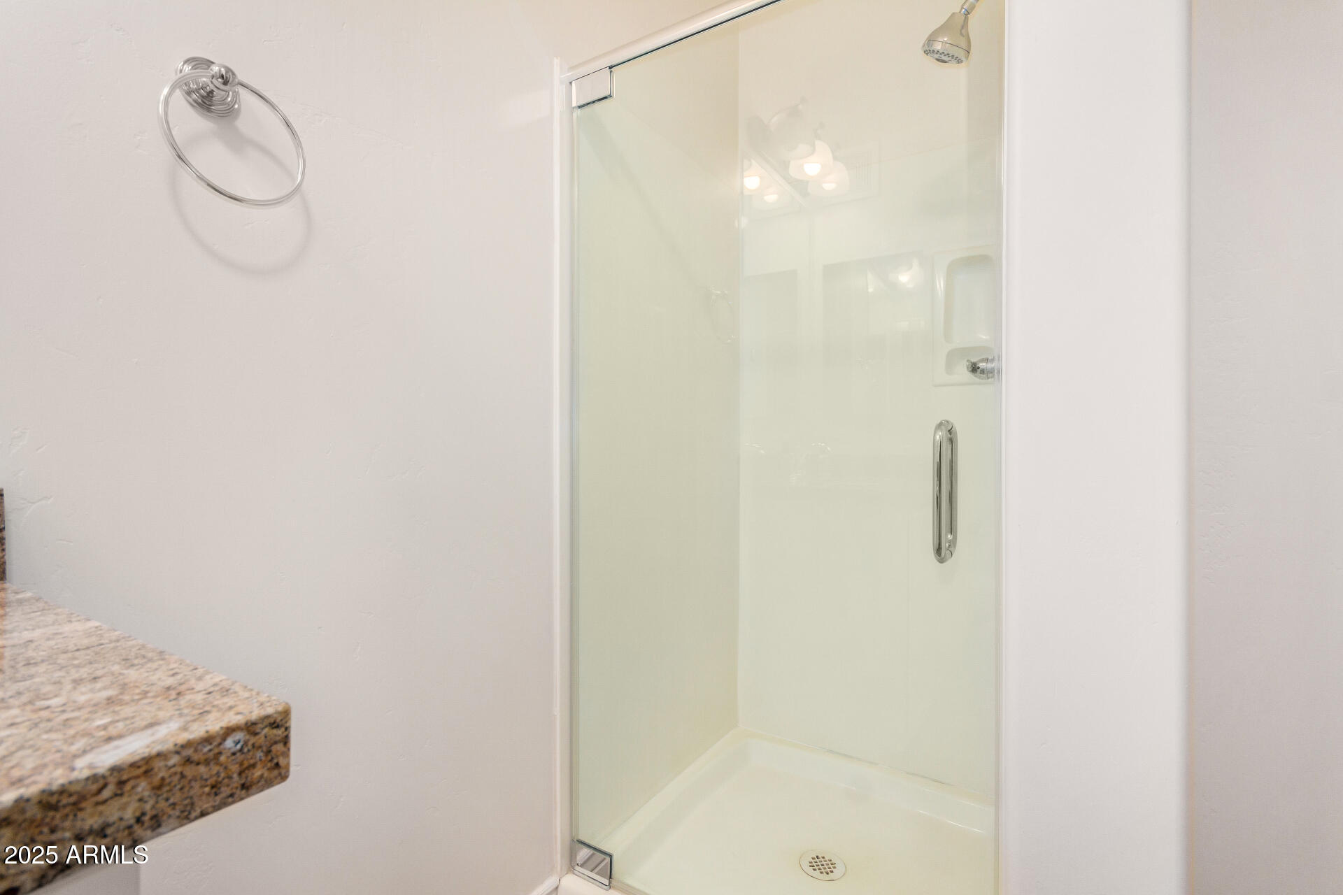 5450 East Deer Valley Drive, Unit 1211 Phoenix, AZ 85054 - Photo 15 of 26 a bathroom with a shower