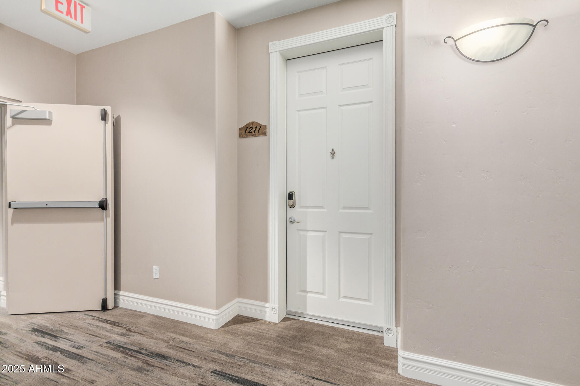 5450 East Deer Valley Drive, Unit 1211 Phoenix, AZ 85054 - Photo 17 of 26 a view of room with wooden floor