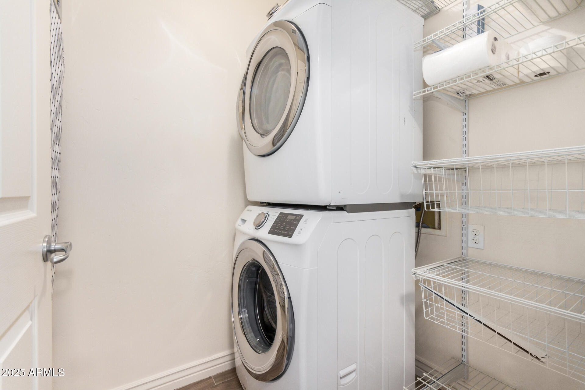 5450 East Deer Valley Drive, Unit 1211 Phoenix, AZ 85054 - Photo 6 of 26 a utility room with dryer and washer
