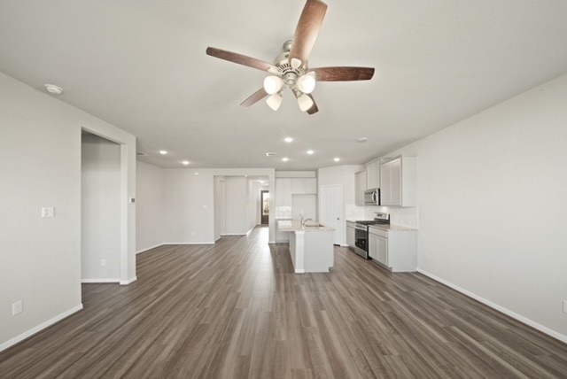 10422 Sherwin Pass Drive Rosharon, TX 77583 - Photo 15 of 26 a view of a kitchen with a sink and wooden floor
