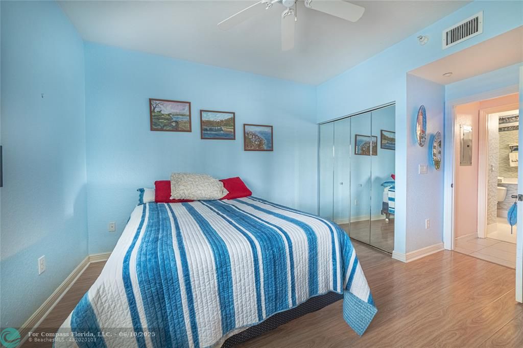 7739 Southampton Terrace, Unit 202 Tamarac, FL 33321 - Photo 11 of 39 a bedroom with bed and a closet