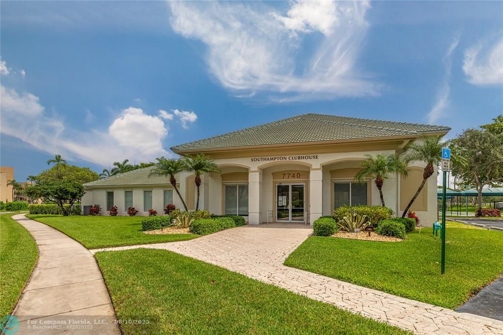 7739 Southampton Terrace, Unit 202 Tamarac, FL 33321 - Photo 24 of 39 a view of a house with a yard