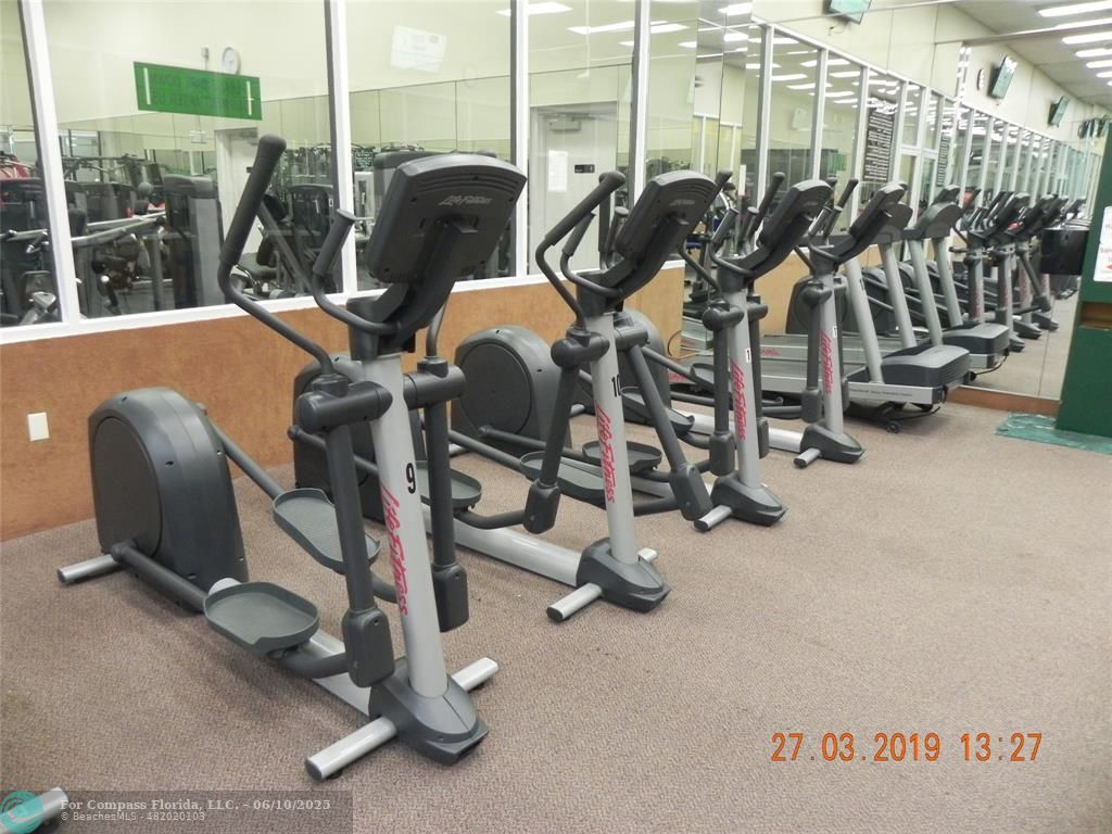 7739 Southampton Terrace, Unit 202 Tamarac, FL 33321 - Photo 33 of 39 a view of a room with gym equipment