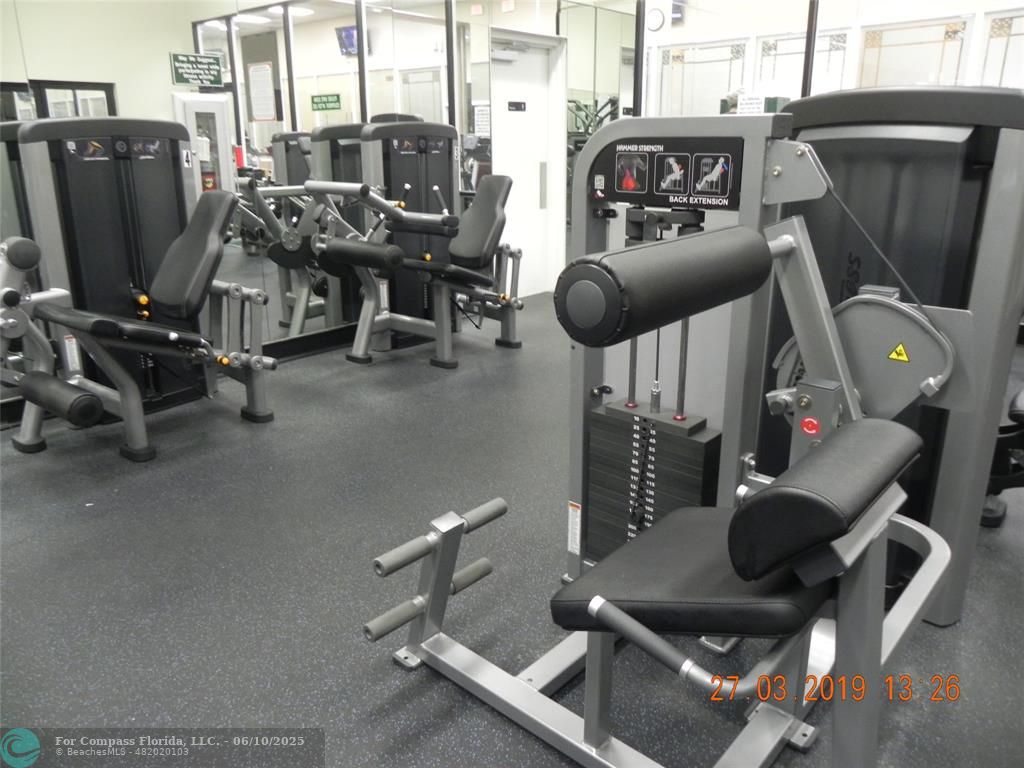 7739 Southampton Terrace, Unit 202 Tamarac, FL 33321 - Photo 34 of 39 a view of a room with gym equipment