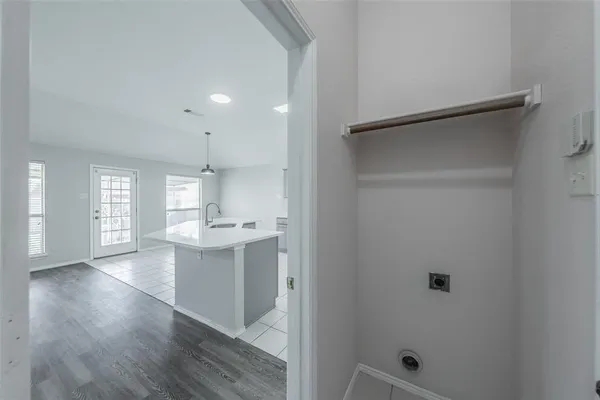 a view of a kitchen and a sink