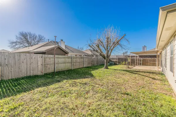 a view of a backyard with a garden
