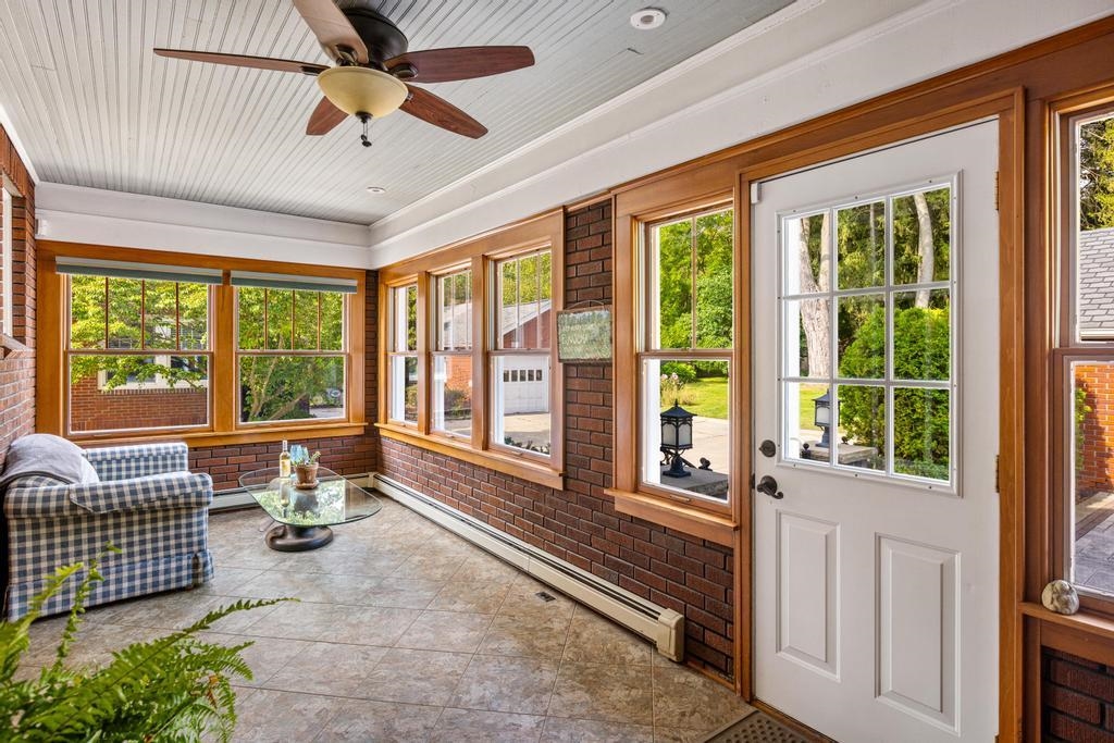 1059 North Riverside Avenue St. Clair, MI 48079 - Photo 11 of 27 Durable vinyl flooring, windows all around perfect spot for a cup of tea and a good book!
