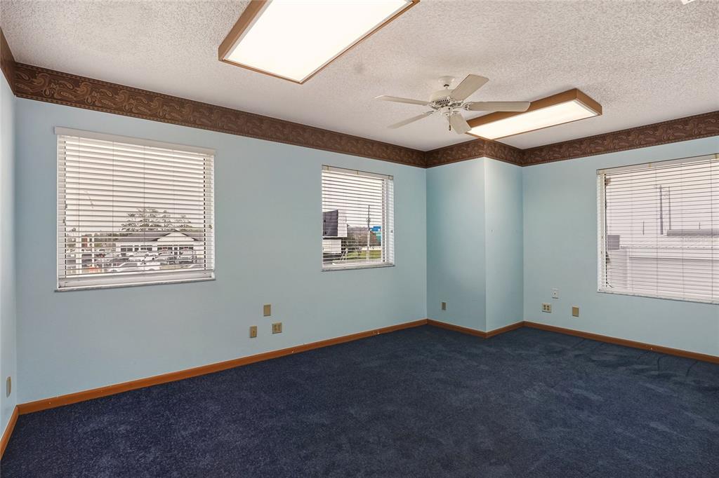 1803 3rd Street Southwest Winter Haven, FL 33880 - Photo 25 of 66 a view of an empty room with a window