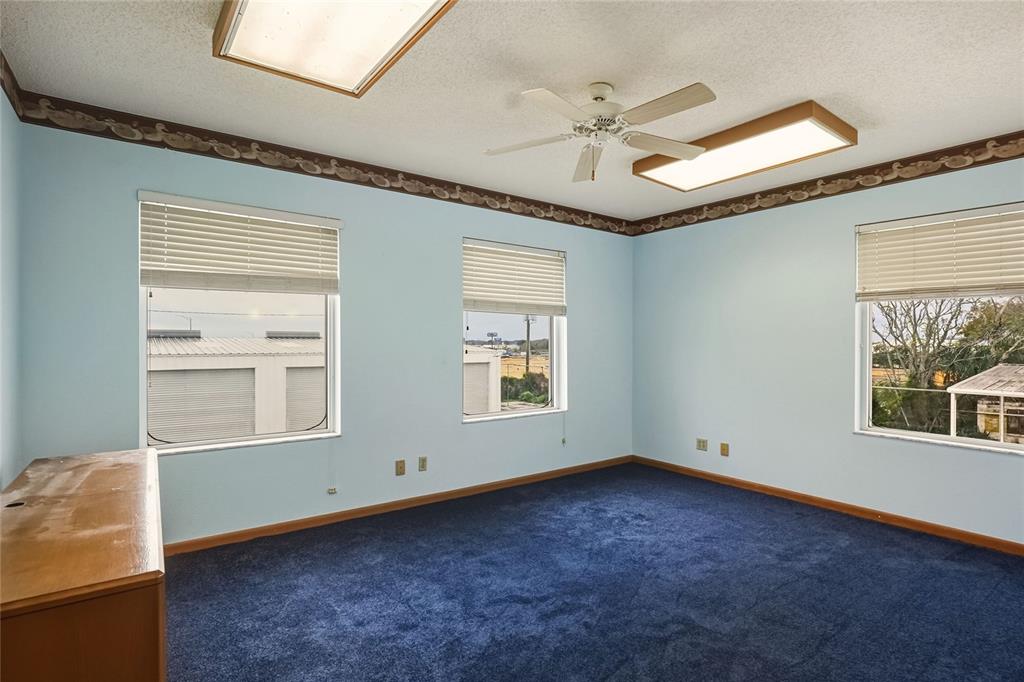 1803 3rd Street Southwest Winter Haven, FL 33880 - Photo 27 of 66 a view of an empty room with a window