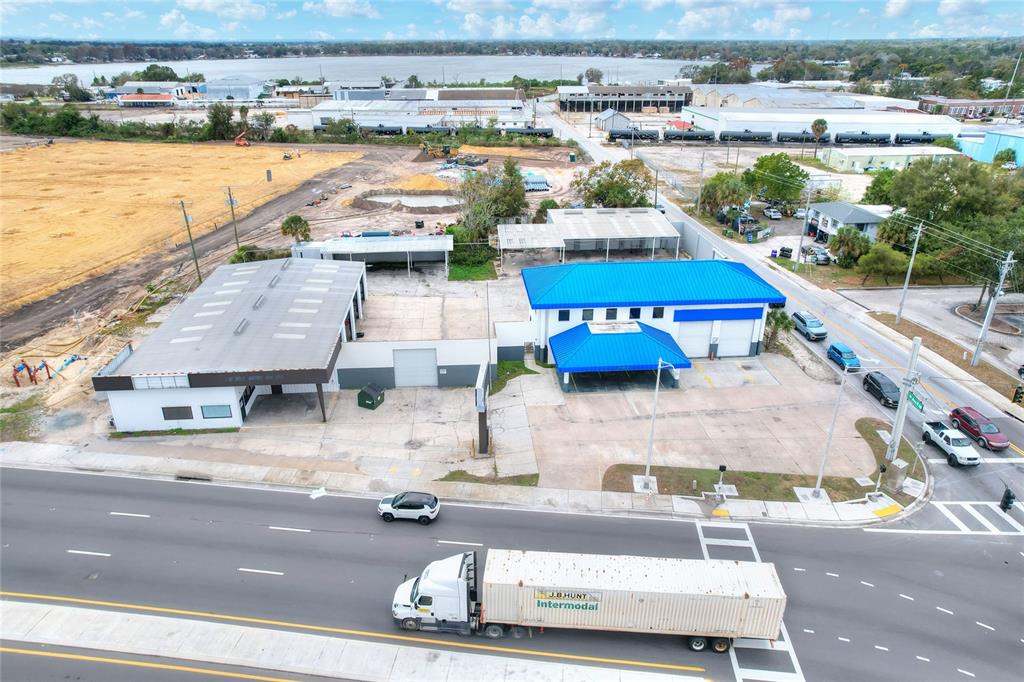 1803 3rd Street Southwest Winter Haven, FL 33880 - Photo 59 of 66 an aerial view of residential houses with outdoor space