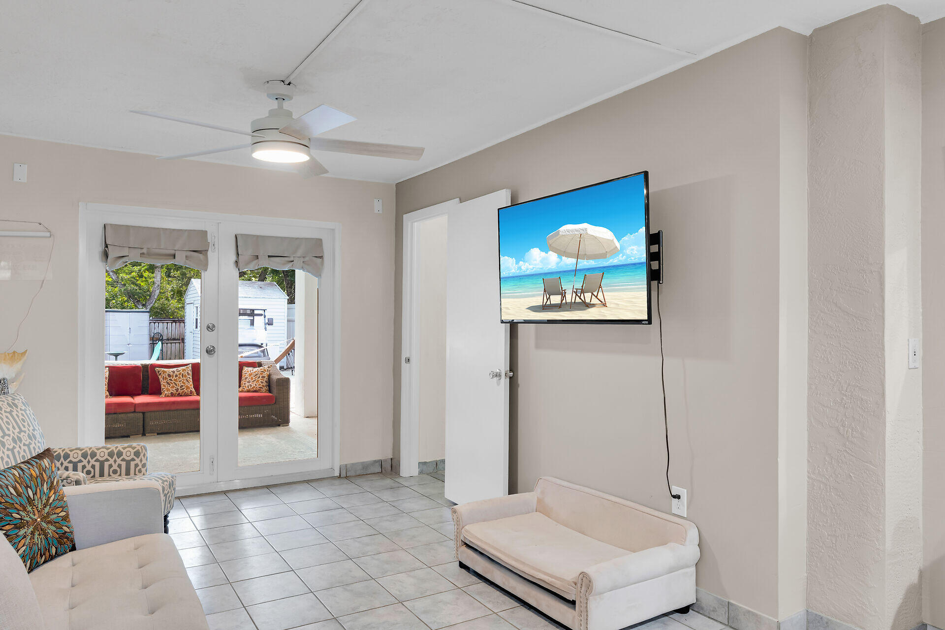 593 Bonito Avenue Key Largo, FL 33037 - Photo 13 of 72 a living room with furniture and chandelier