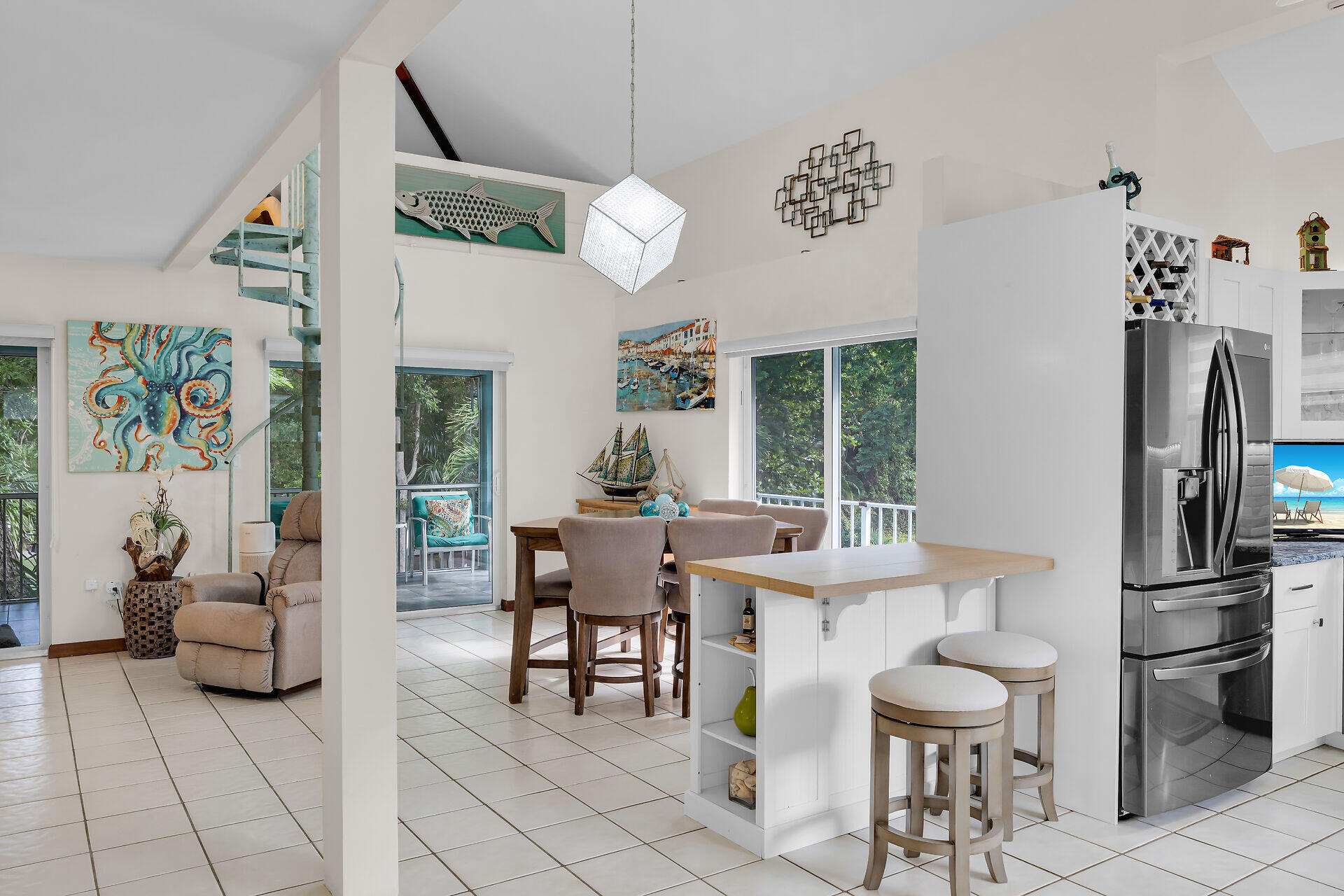 593 Bonito Avenue Key Largo, FL 33037 - Photo 19 of 72 a view of a dining room with furniture window and outside view