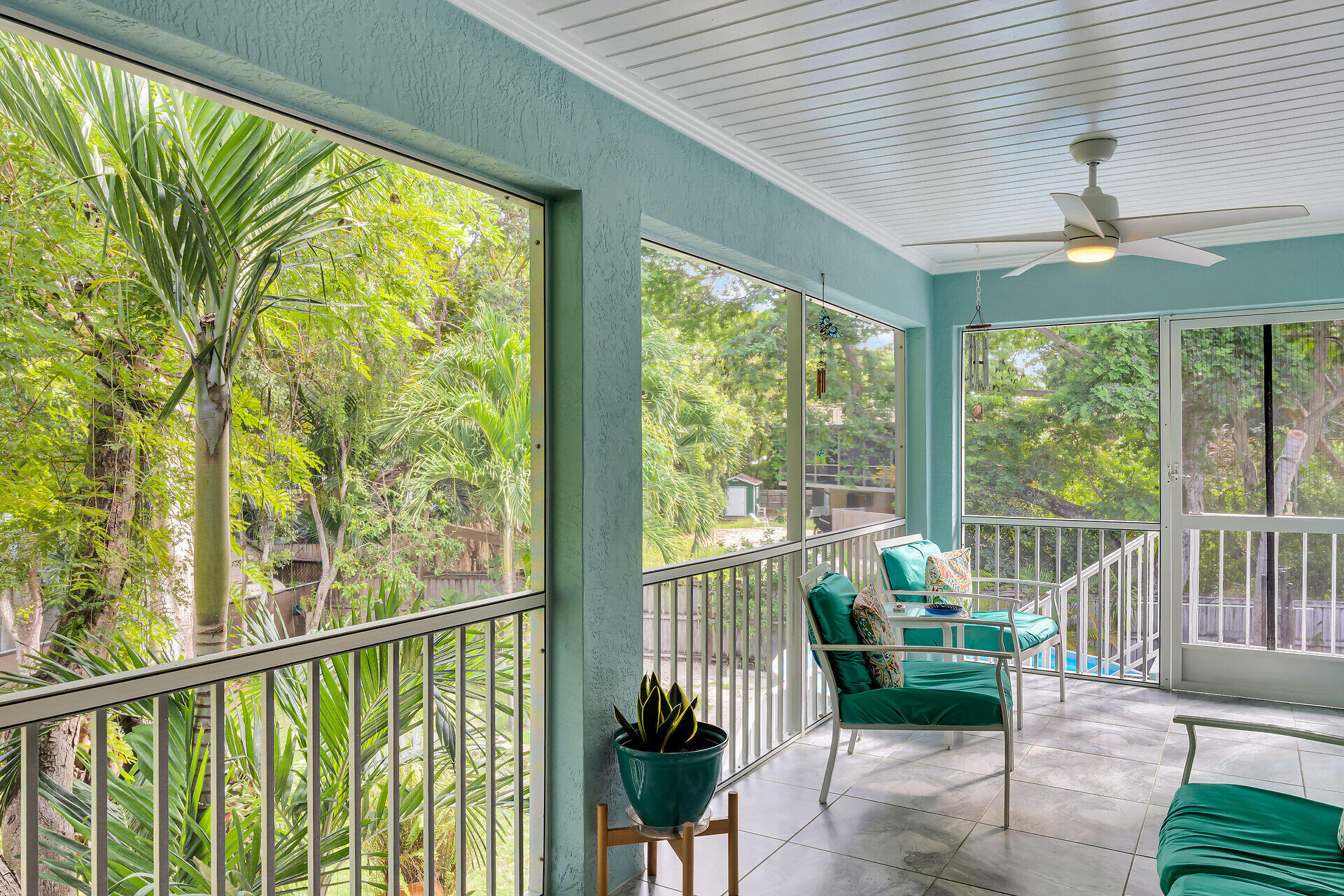 593 Bonito Avenue Key Largo, FL 33037 - Photo 26 of 72 a view of a porch with furniture and garden