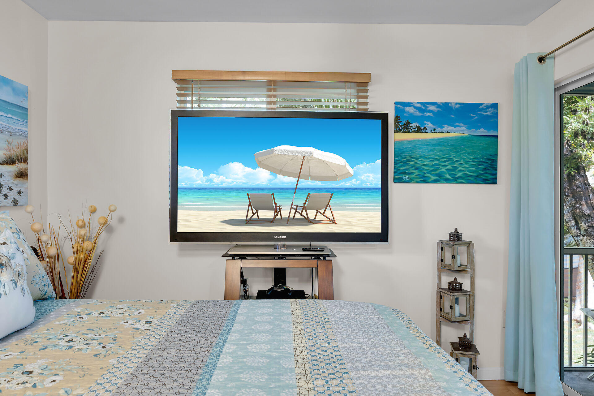 593 Bonito Avenue Key Largo, FL 33037 - Photo 30 of 72 a bedroom with a bed and a fireplace