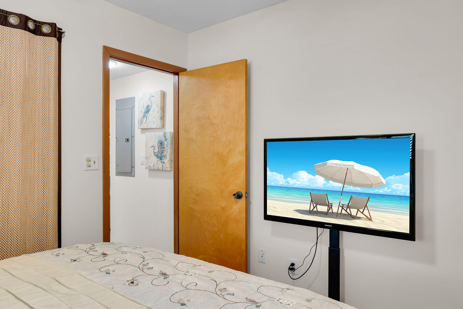 593 Bonito Avenue Key Largo, FL 33037 - Photo 36 of 72 a bedroom with a bed and a mirror