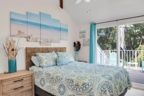 a view of a garden with a house