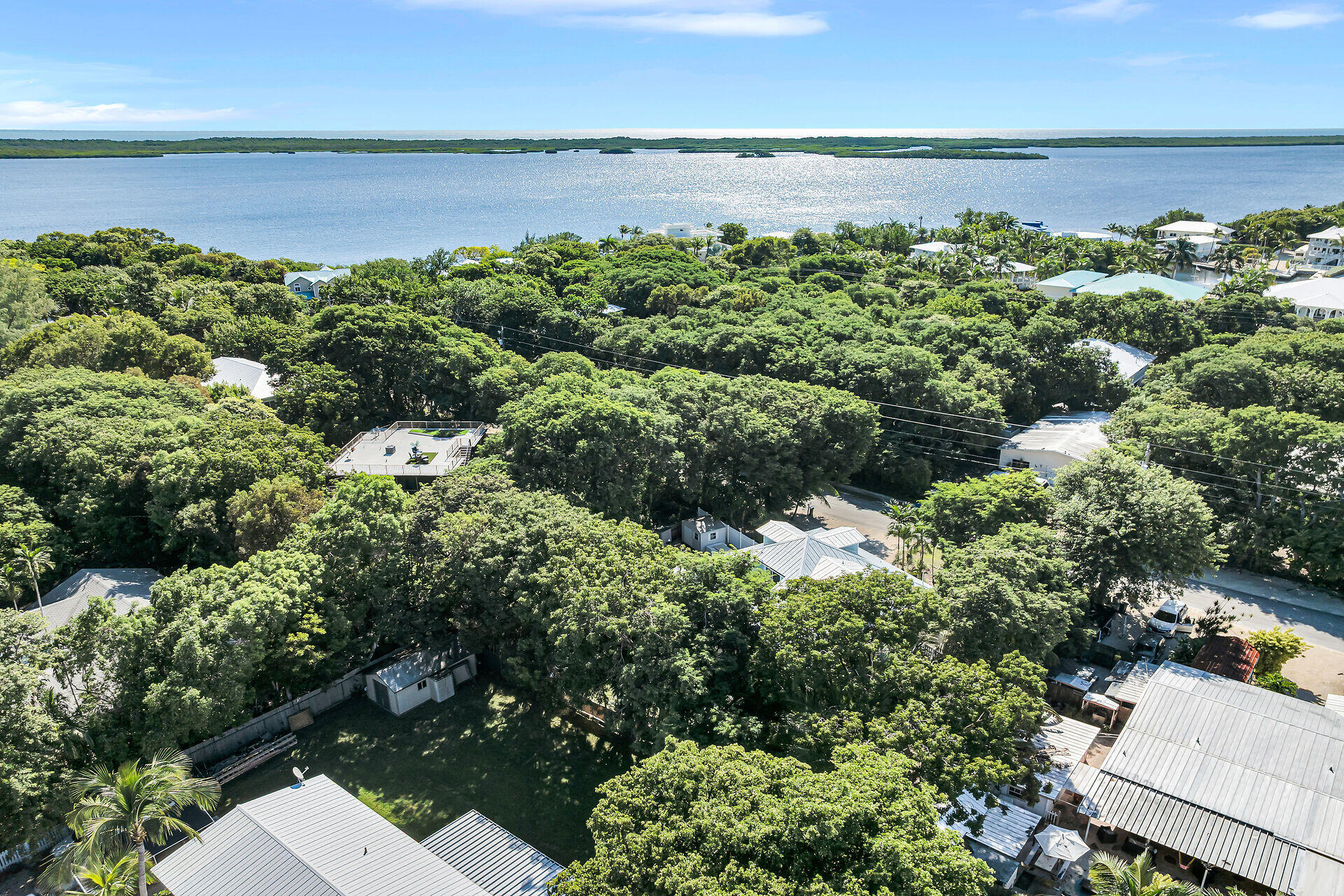 593 Bonito Avenue Key Largo, FL 33037 - Photo 4 of 72 a view of a lake with a city