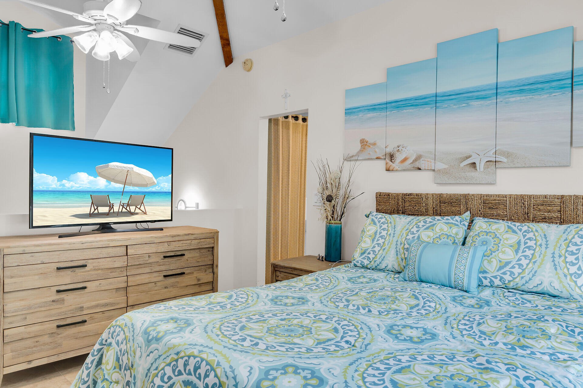 593 Bonito Avenue Key Largo, FL 33037 - Photo 41 of 72 a bedroom with a bed and a flat screen tv