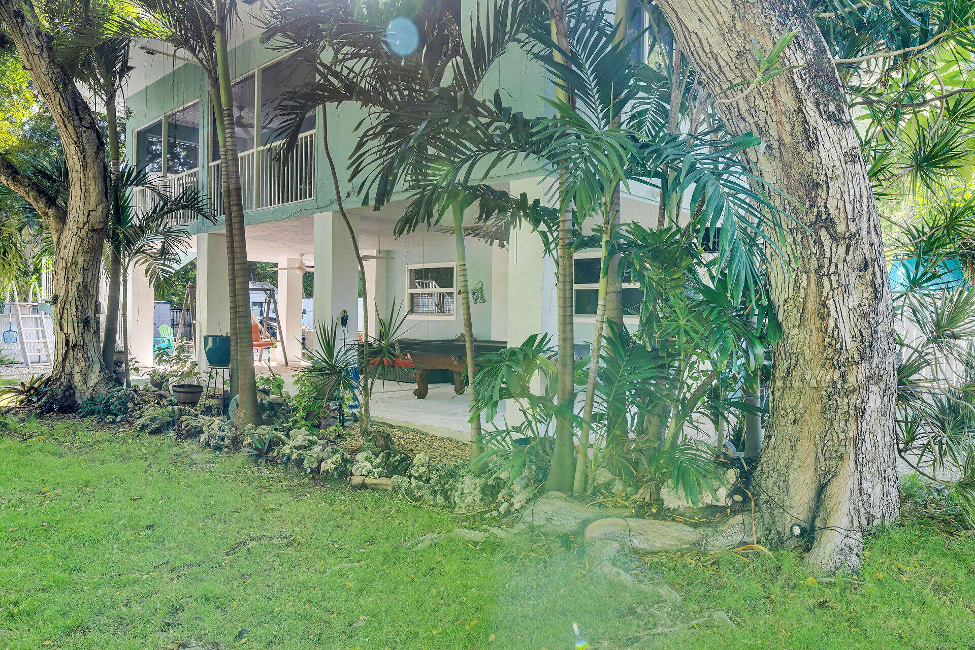 593 Bonito Avenue Key Largo, FL 33037 - Photo 57 of 72 a view of a yard in front of house