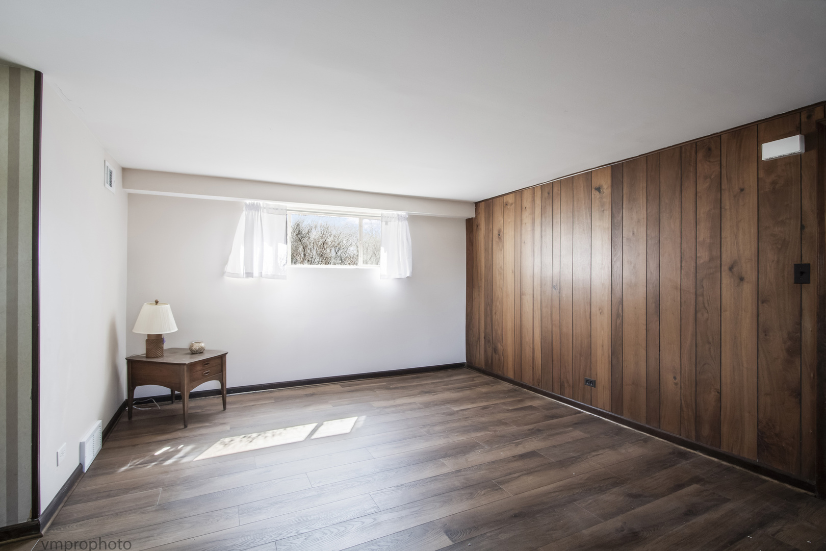 61 Miller Road Lake Zurich, IL 60047 - Photo 19 of 31 an empty room with wooden floor and windows