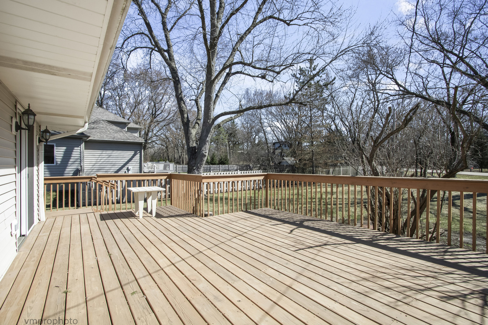 61 Miller Road Lake Zurich, IL 60047 - Photo 22 of 31 a view of balcony with wooden floor and fence