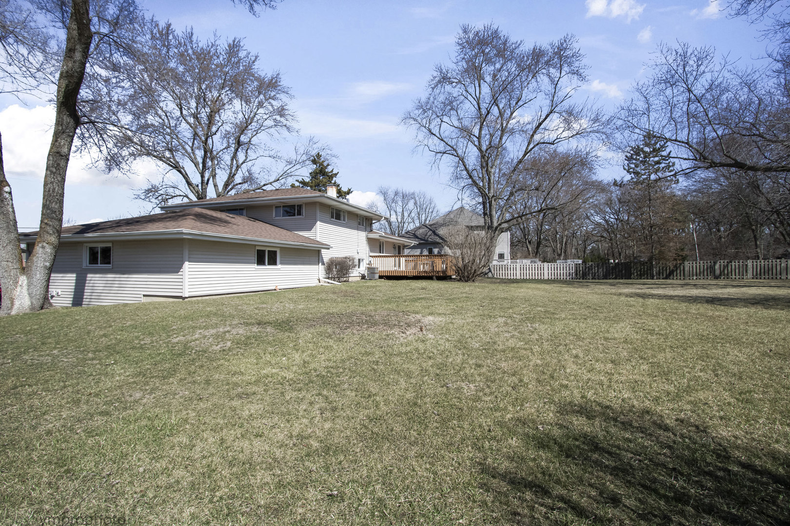 61 Miller Road Lake Zurich, IL 60047 - Photo 25 of 31 a front view of a house with a yard