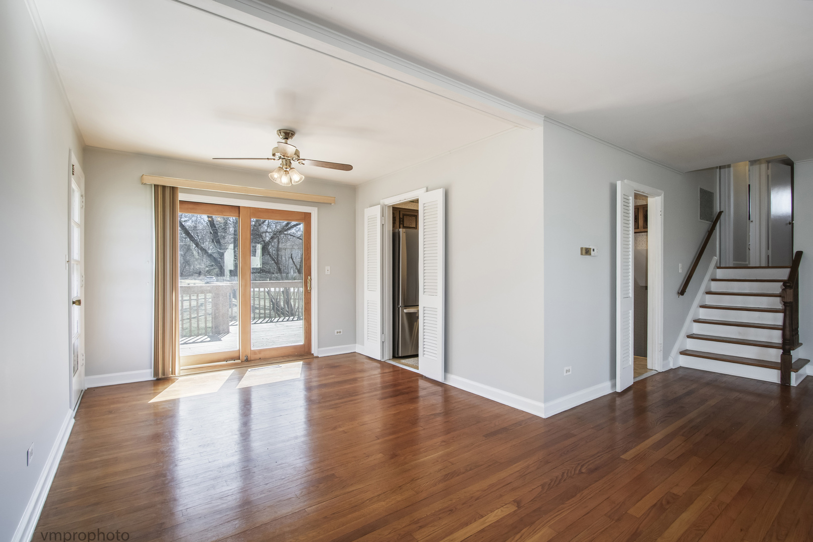 61 Miller Road Lake Zurich, IL 60047 - Photo 5 of 31 wooden floor in an empty room with a window