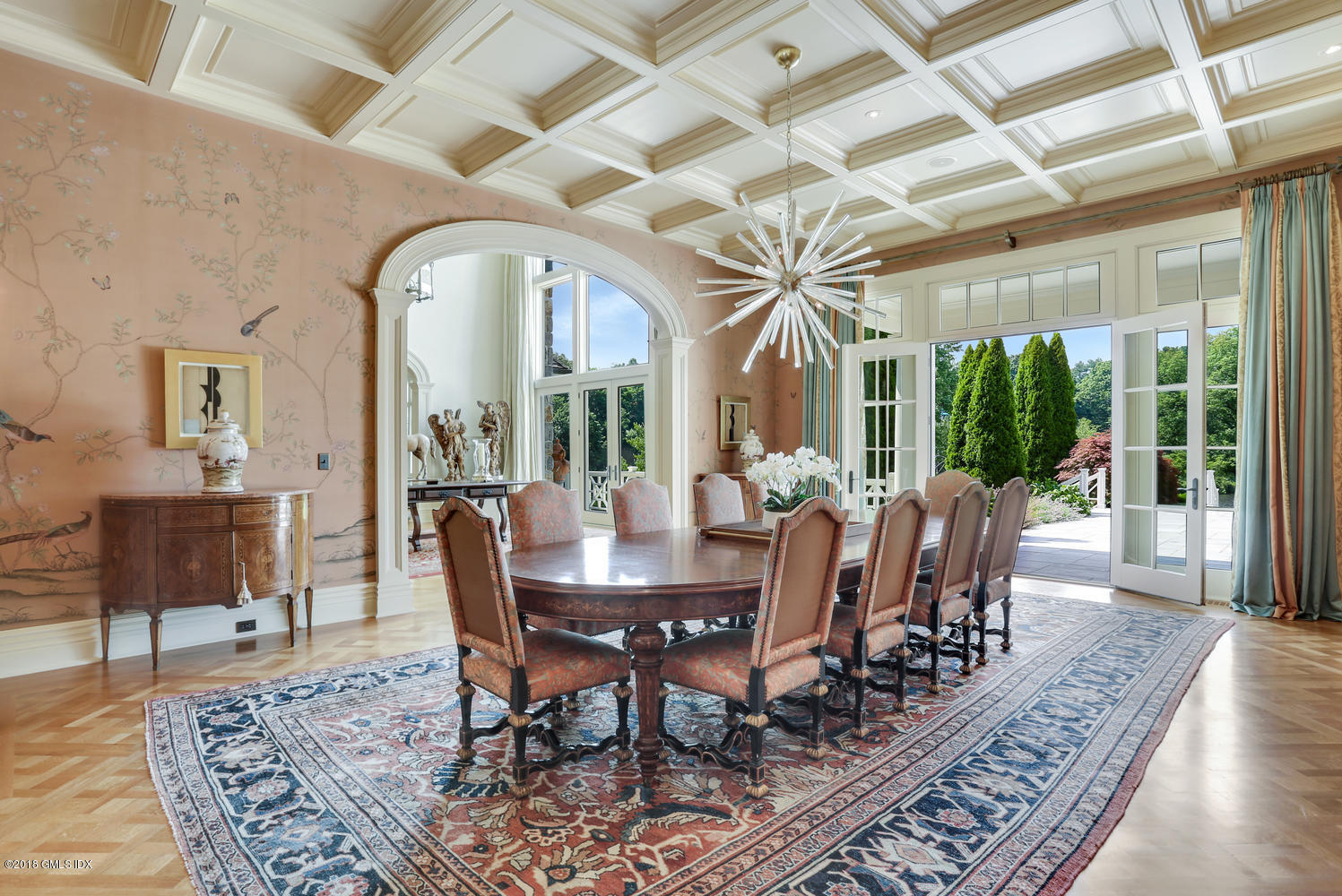 35 Close Road Greenwich, CT 06831 - Photo 11 of 78 a view of a dining room with furniture wooden floor and a chandelier