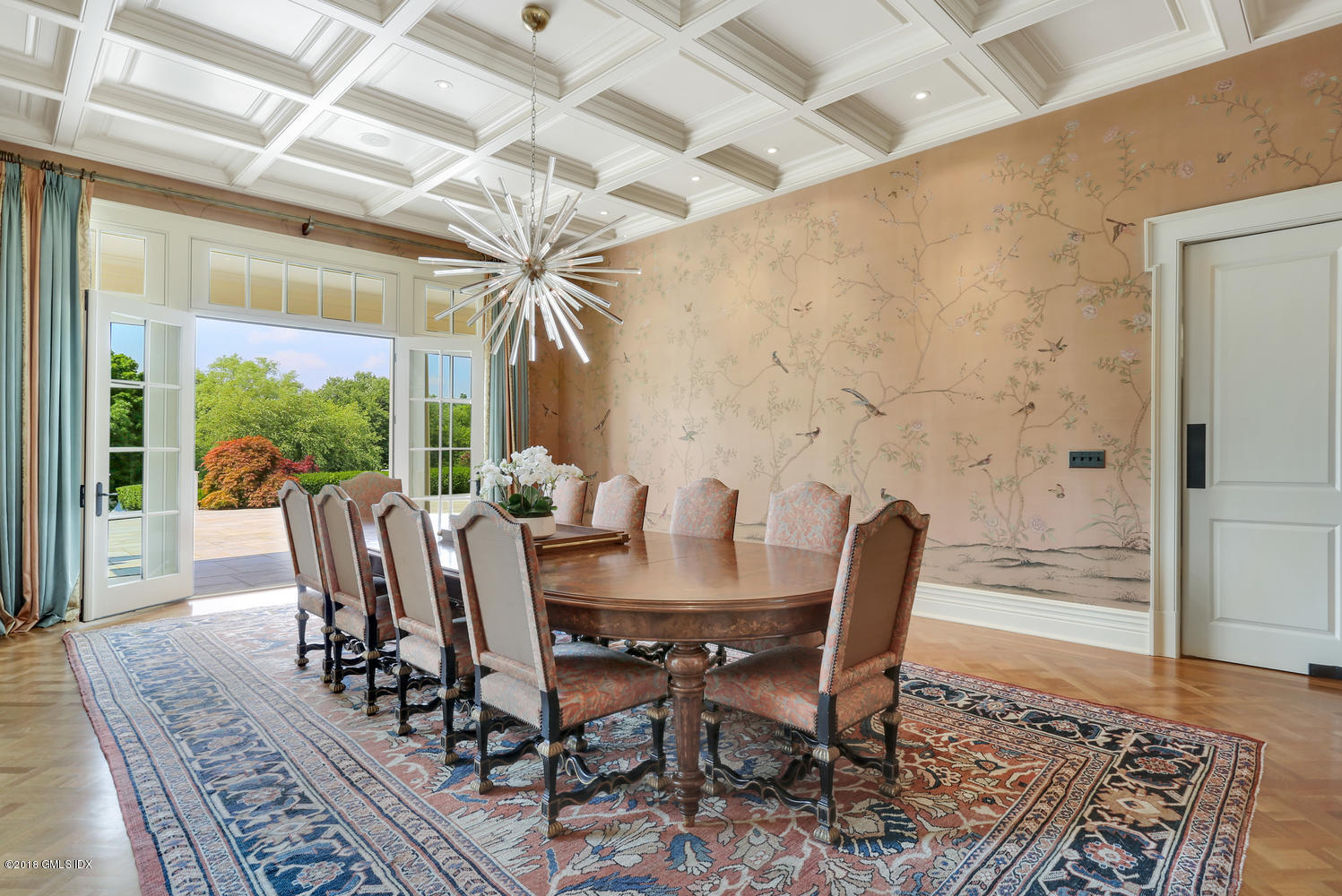 35 Close Road Greenwich, CT 06831 - Photo 12 of 78 a view of a dining room with furniture wooden floor and chandelier