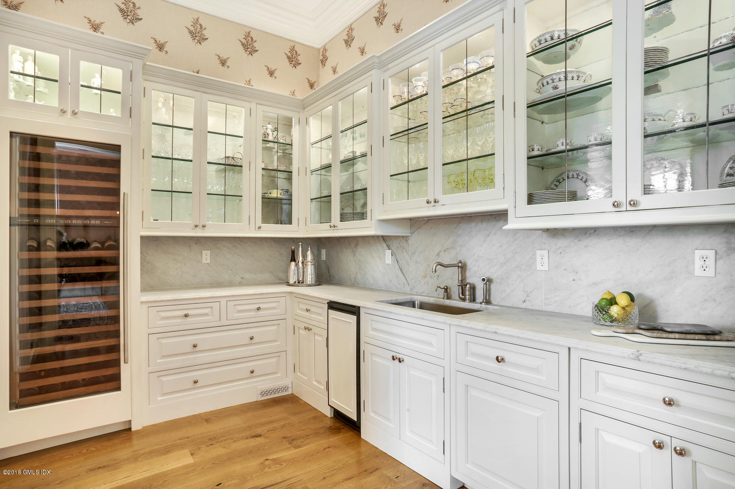 35 Close Road Greenwich, CT 06831 - Photo 13 of 78 a kitchen with stainless steel appliances cabinets and a window