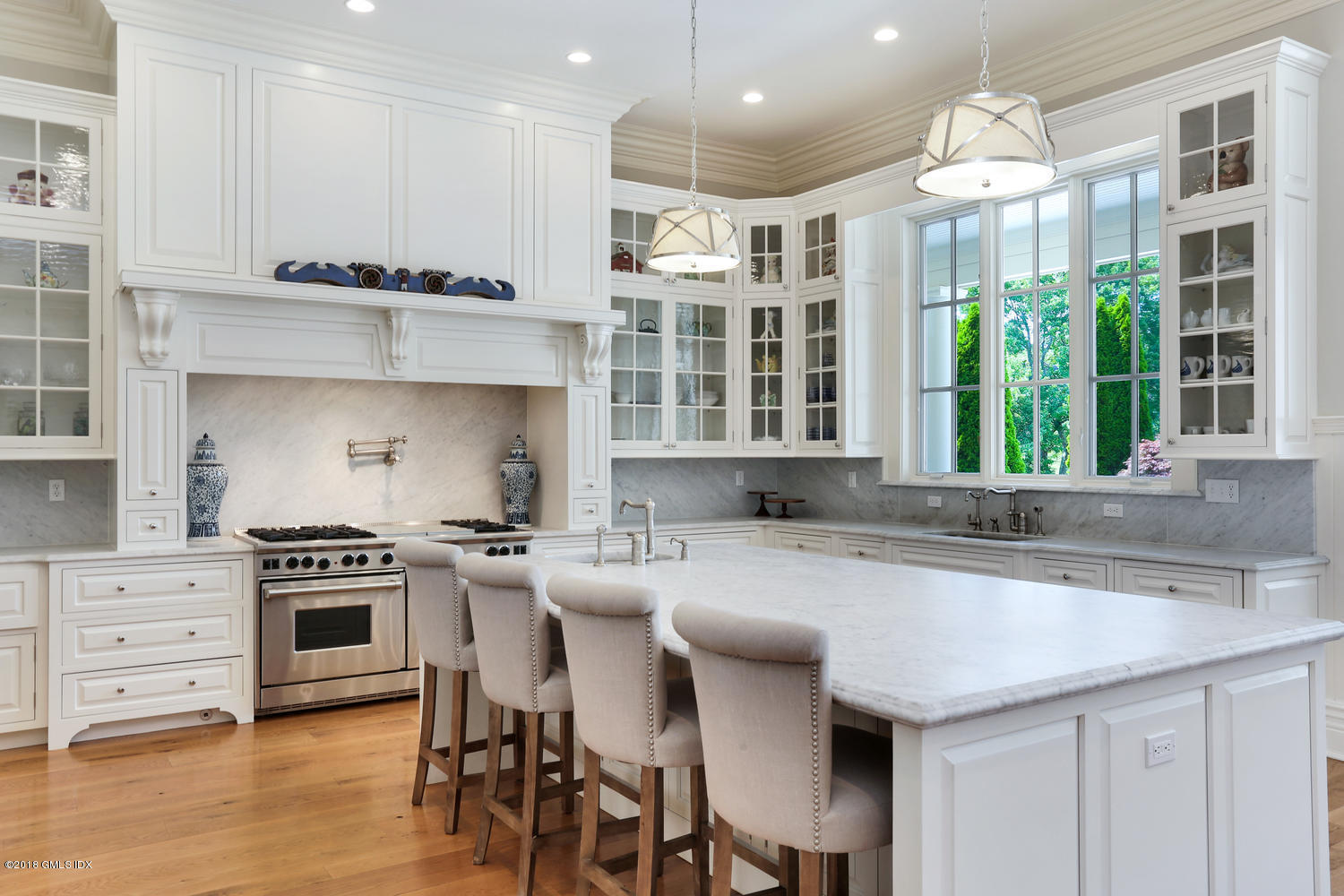 35 Close Road Greenwich, CT 06831 - Photo 16 of 78 a kitchen with a stove a sink and a refrigerator